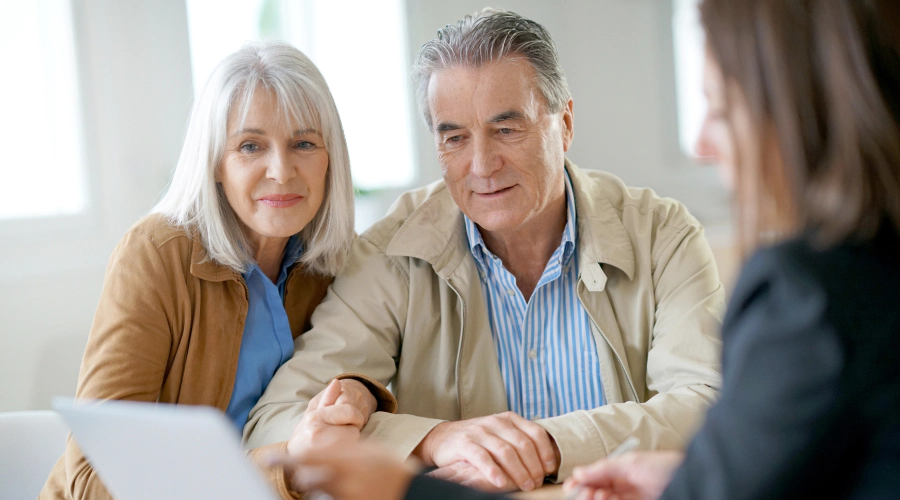 elder couple in a meeting with insurance agent